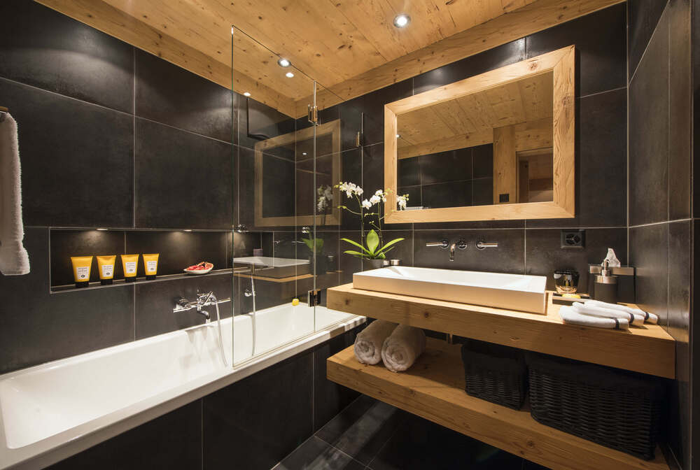 A smart en-suite bathroom in the Chalet White Ace, Gstaad