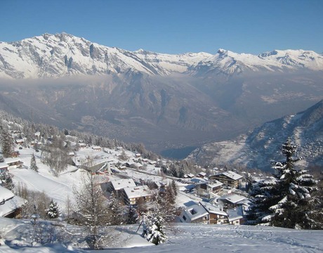 Chalets in Tzoumaz Switzerland - a view from the mountain Chalets in Tzoumaz Switzerland - a view from the mountain